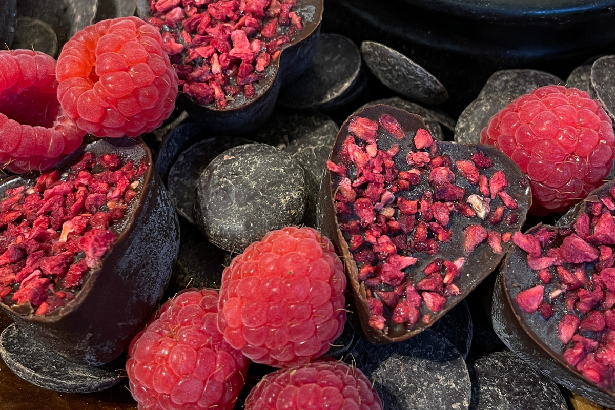 Wombshine raspberry truffle hearts and fresh raspberries